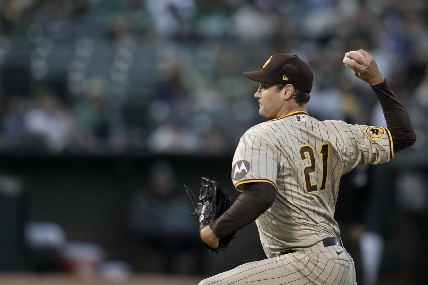 San Diego Padres pitcher Seth Lugo throws to an Oakland Athletics batter during the first inning of a baseball game Friday, Sept. 15, 2023, in Oakland, Calif. (AP Photo/Godofredo A. Vásquez)