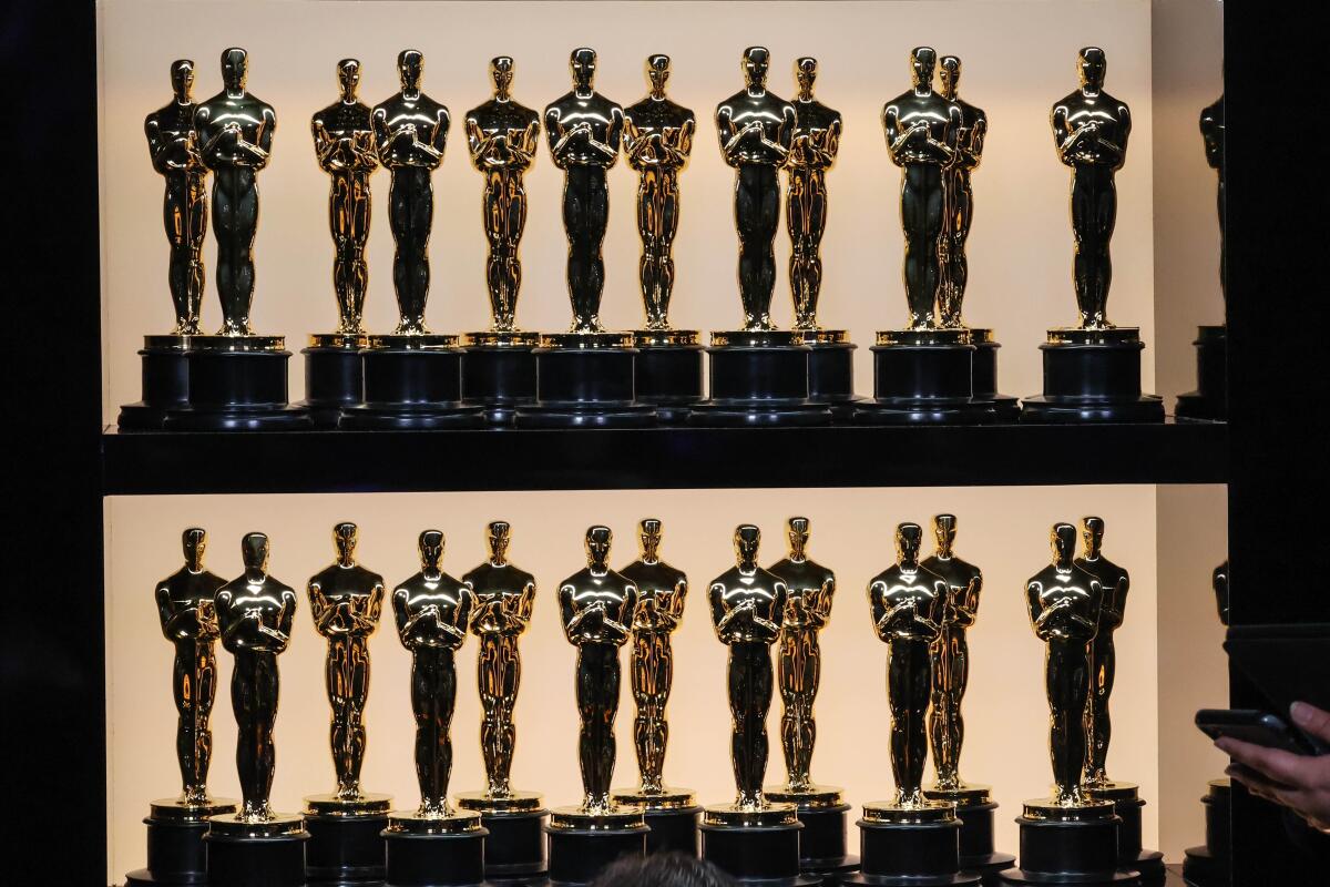 A shelf of Oscars statuettes