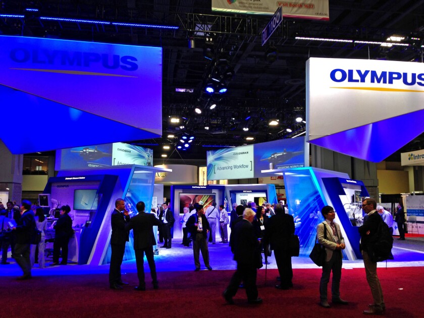 A showcase for Olympus products on the exhibit floor at the Digestive Disease Week conference in Washington, D.C.