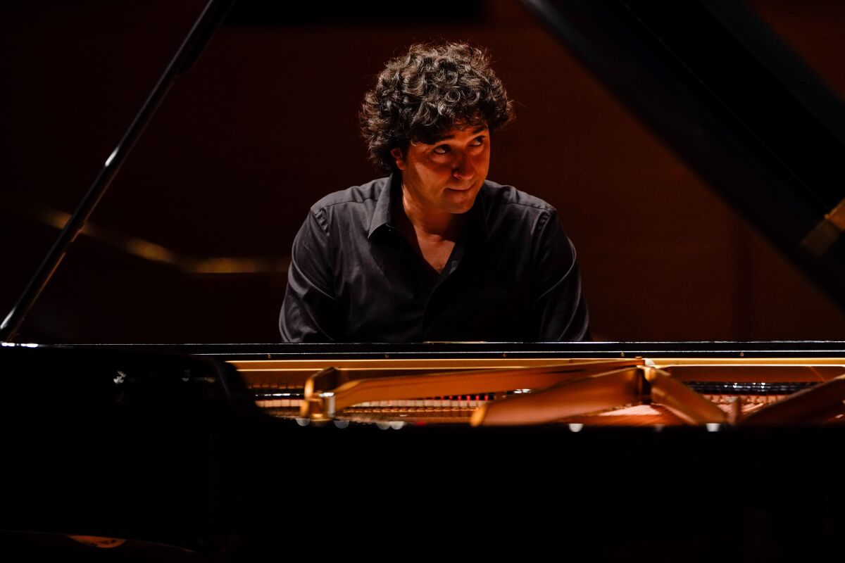 Sergio Tiempo performs with the L.A. Phil in the world premiere of Esteban Benzecry’s Piano Concerto at Disney Hall.