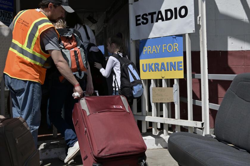 Ukrainian refugees were bused to be quickly processed at the PedWest border crossing.