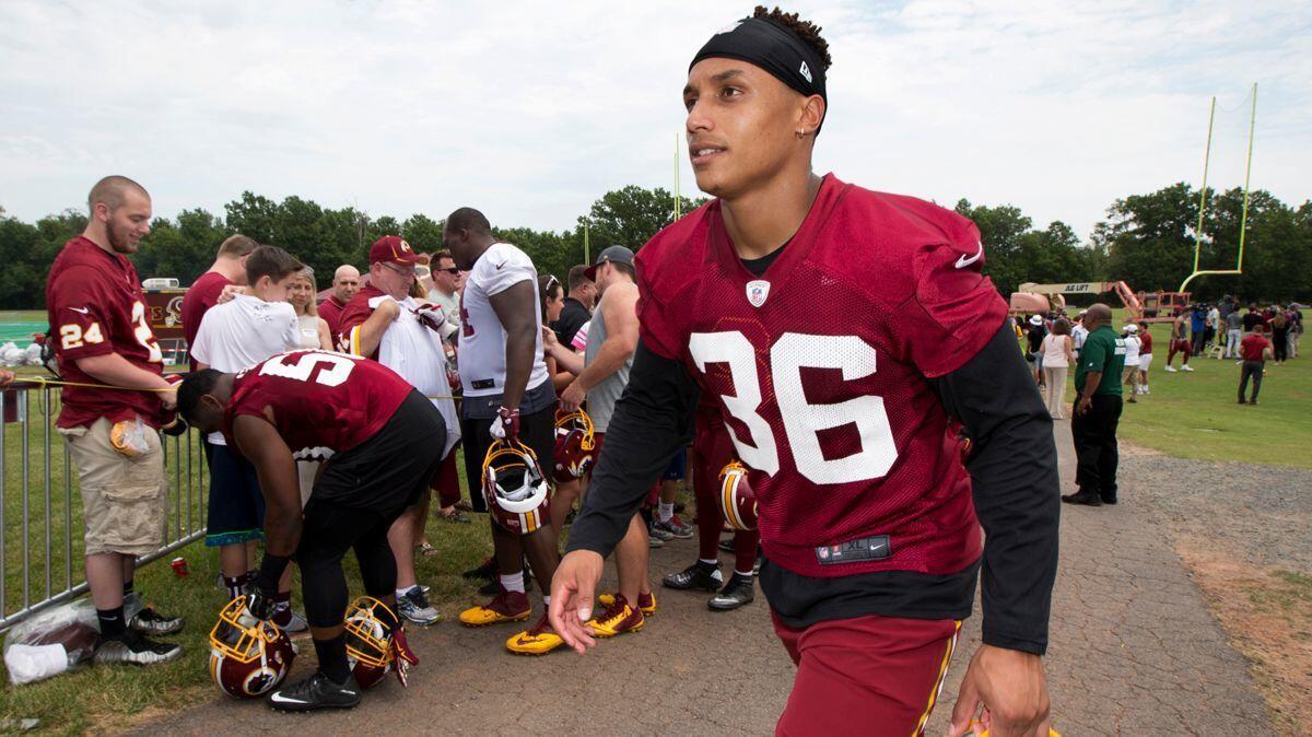 Washington Redskins safety Su'a Cravens walking from the field during the team's minicamp at the Redskins Park in Ashburn, Va. on June 15, 2016.
