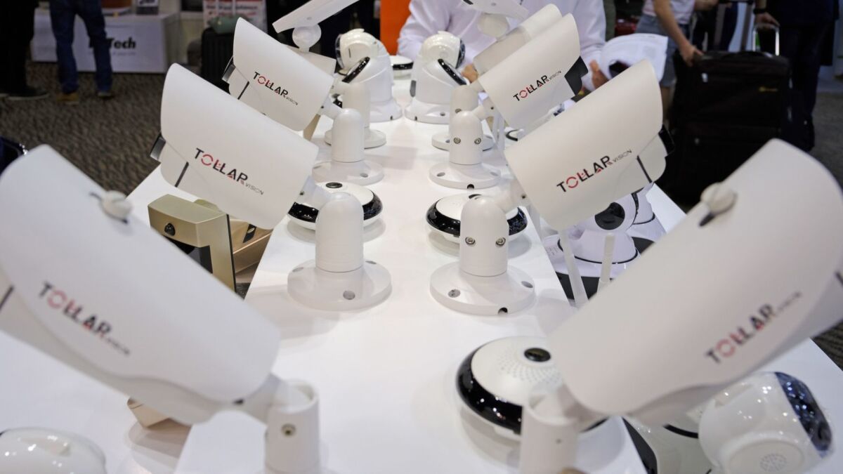 Chinese-made security cameras are on display at a trade fair.