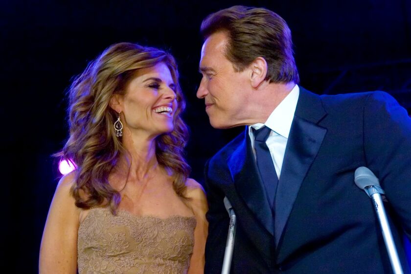 FILE - California first lady Maria Shriver and California Gov. Arnold Schwarzenegger smile together, at the Governor's Inaugural Ball at the Sacramento Convention Center, Friday, Jan. 5, 2007, in Sacramento, Calif. Schwarzenegger and Shriver’s marriage is officially over more than 10 years after the award-winning journalist petitioned to end her then-25-year marriage to the action star and former California governor. A Los Angeles judge finalized the divorce on Tuesday, Dec. 28, 2021, court records show. (Brian Baer/The Sacramento Bee via AP, Pool, File)