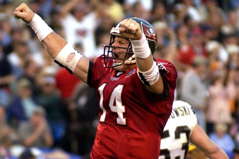 Tampa Bay Buccaneers quarterback Brad Johnson celebrates a touchdown against the Oakland Raiders in Super Bowl XXXVII at Qualcomm Stadium in San Diego on Jan. 26, 2003.