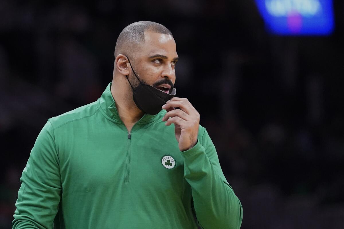 Boston Celtics head coach Ime Udoka calls to his players during the first half of an NBA preseason basketball game against the Orlando Magic, Monday, Oct. 4, 2021, in Boston. (AP Photo/Charles Krupa)