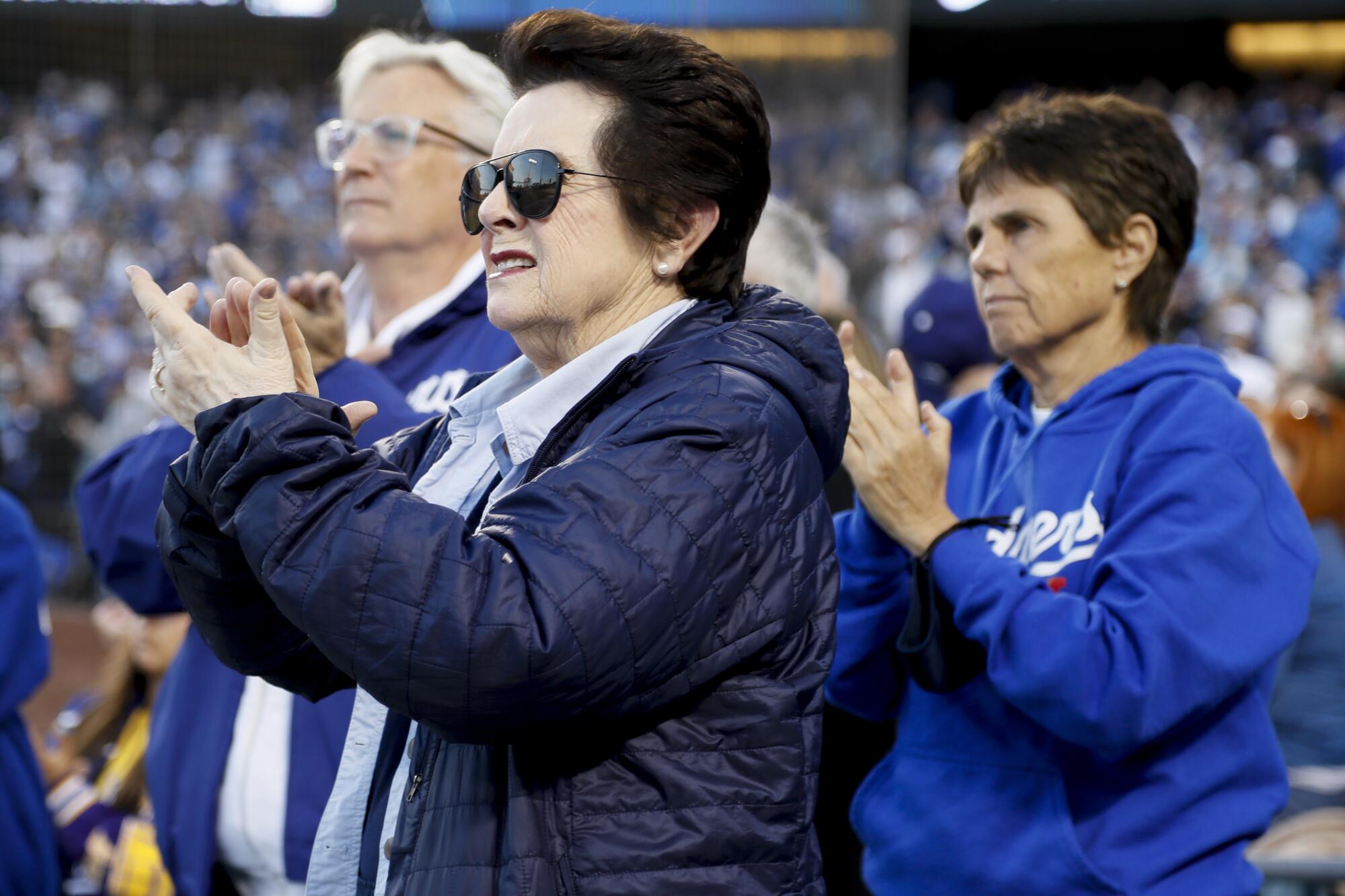  Billie Jean King applauds as a veteran is honored.