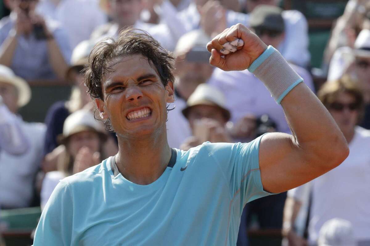 Rafael Nadal celebrates after defeating Leonardo Mayer in straight sets during a third-round match at the French Open on Saturday.