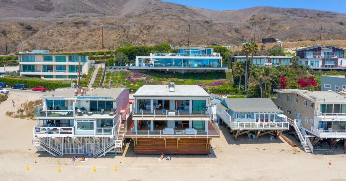 The two-story beach house.