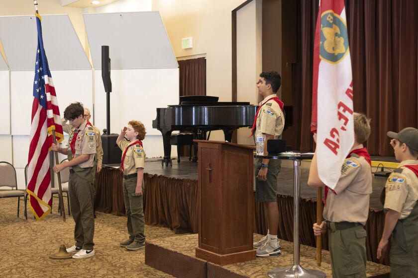 Scouts lead the Pledge of Allegiance