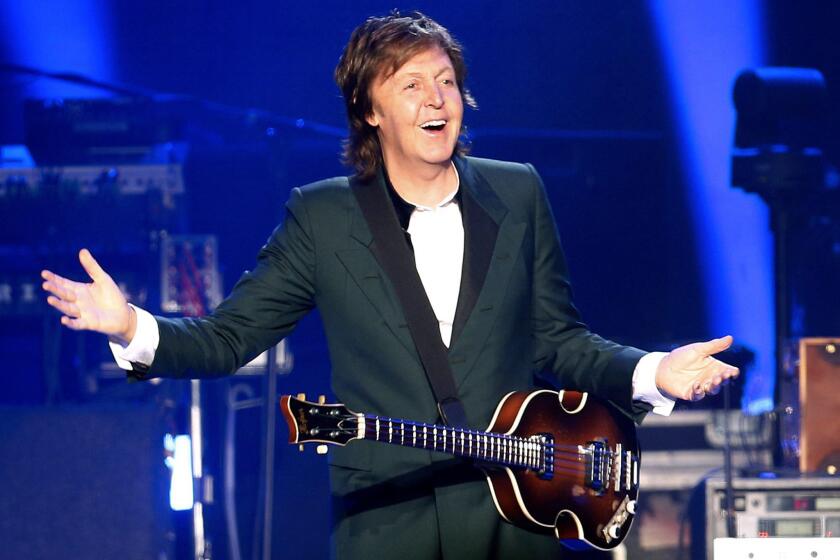 British musician and former Beatles member Paul McCartney performs in Santiago de Chile, Chile, in 2014.