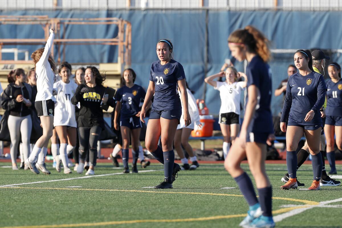 Marina's McKenna Pua (20) looks on after the Vikings lose 3-1 to Capistrano Valley in the quarterfinals of the CIF Southern Section Division 2 playoffs on Wednesday in Huntington Beach.