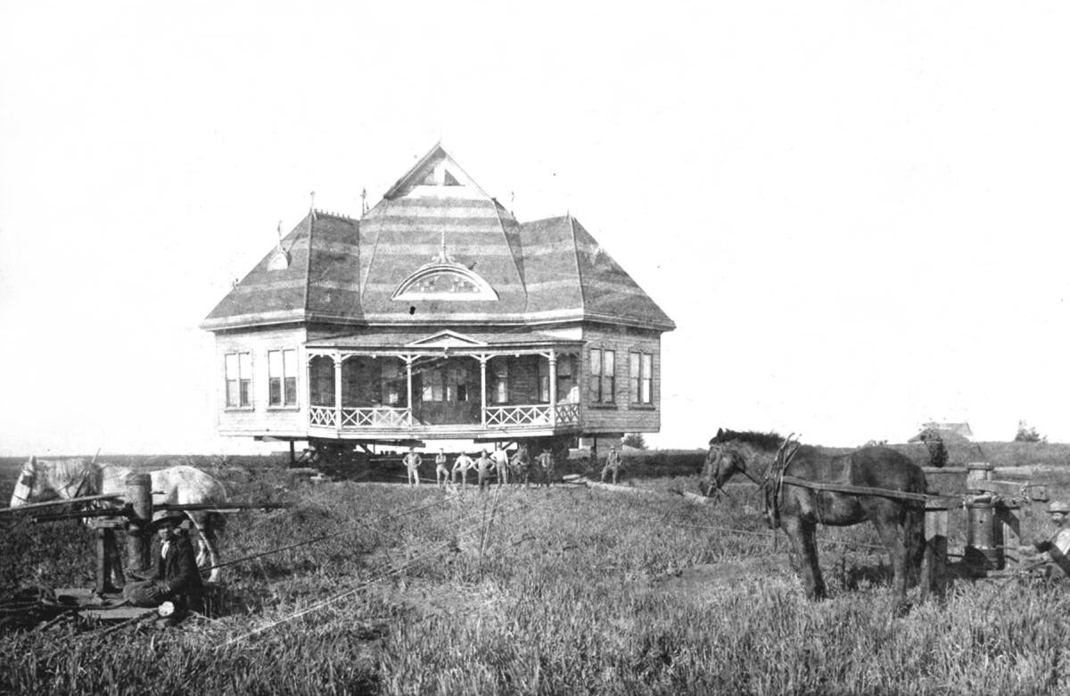The dance pavilion being moved in 1897 to a spot near Hornblend and Morrell streets.