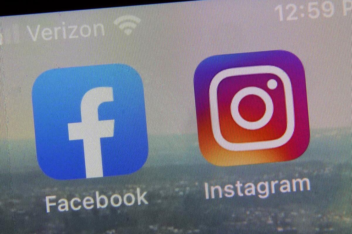 A view of the mobile phone app logos for Facebook and Instagram 