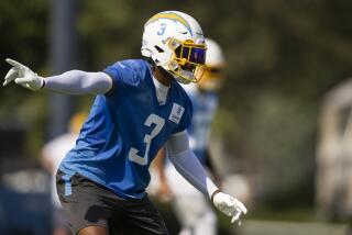 Chargers safety Derwin James Jr. gestures during a training camp session.