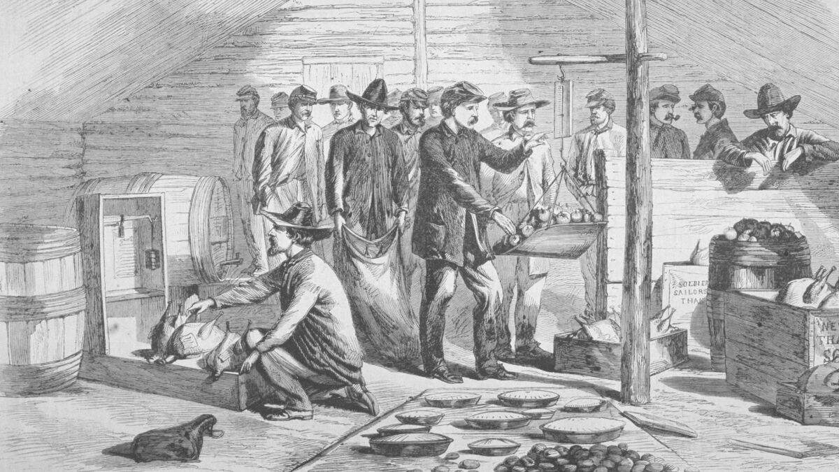 An engraving shows Union troops receiving Thanksgiving rations during the Civil War, circa 1864.