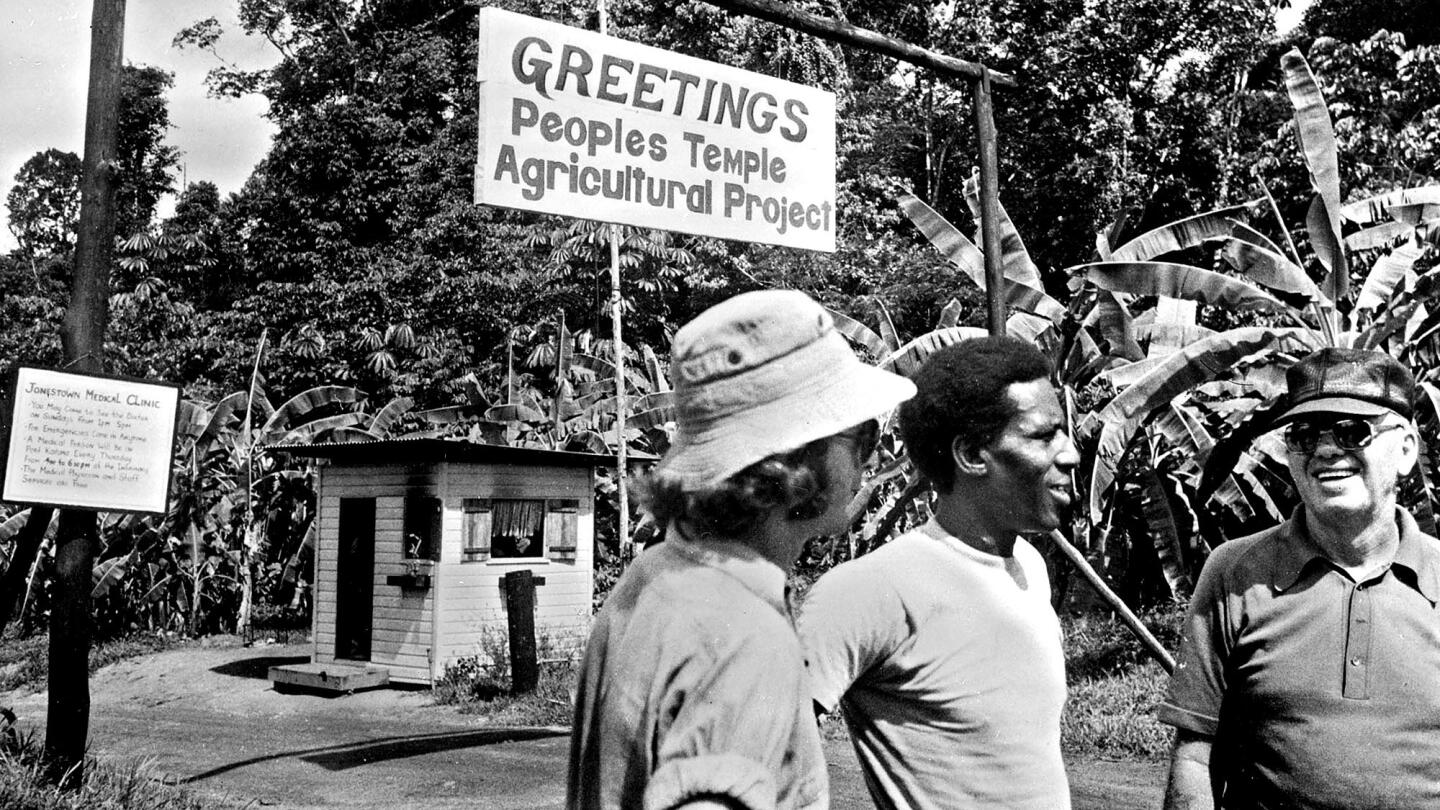People's Temple members in front of the agricultural department of the sect, in Georgetown, renamed Jonestown after guru Jim Jones, in 1978.