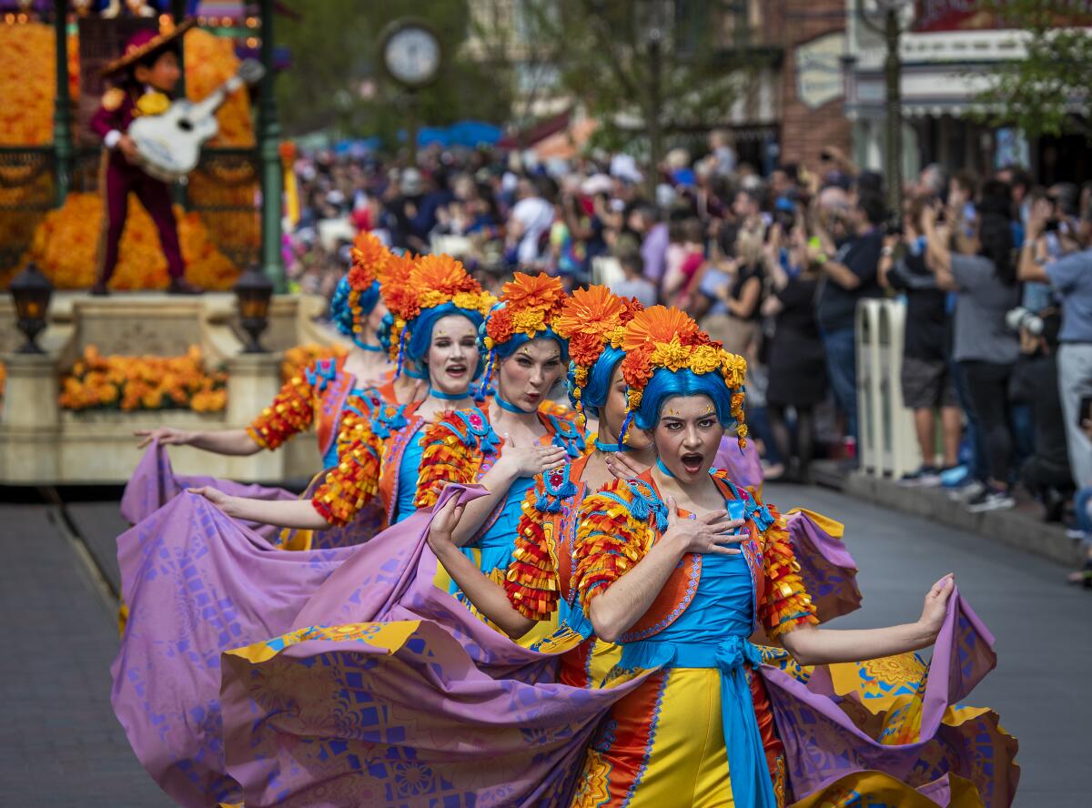"Coco" dancers represent flowers, sporting skirts that double as capes.