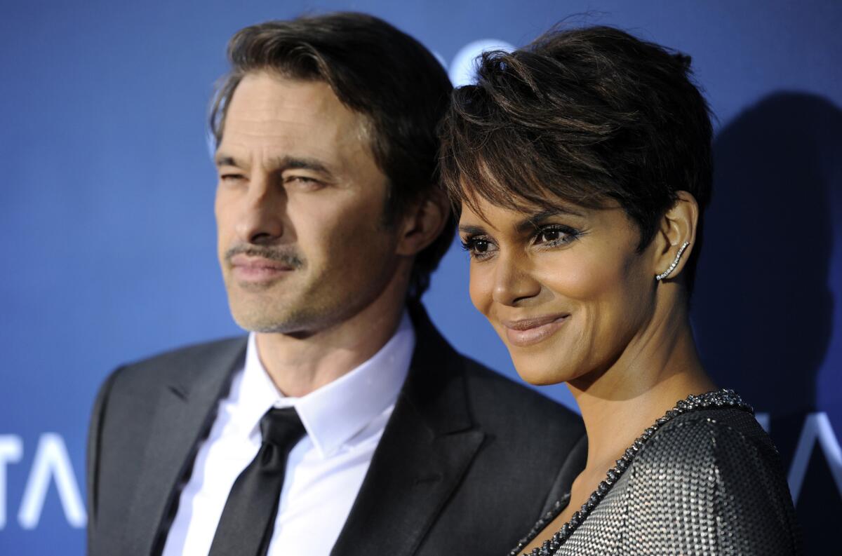 Olivier Martinez, wife Halle Berry get in another scuffle at LAX.