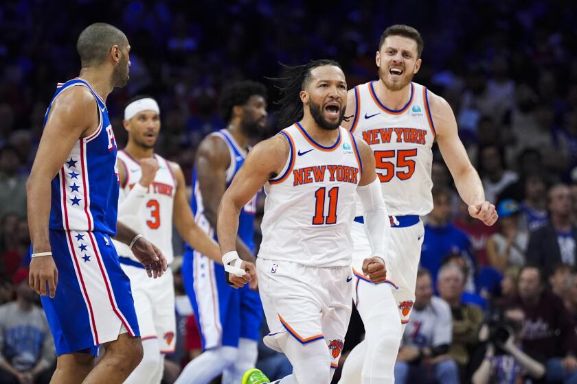 New York Knicks' Jalen Brunson (11) reacts during the second half of Game 6 in an NBA.