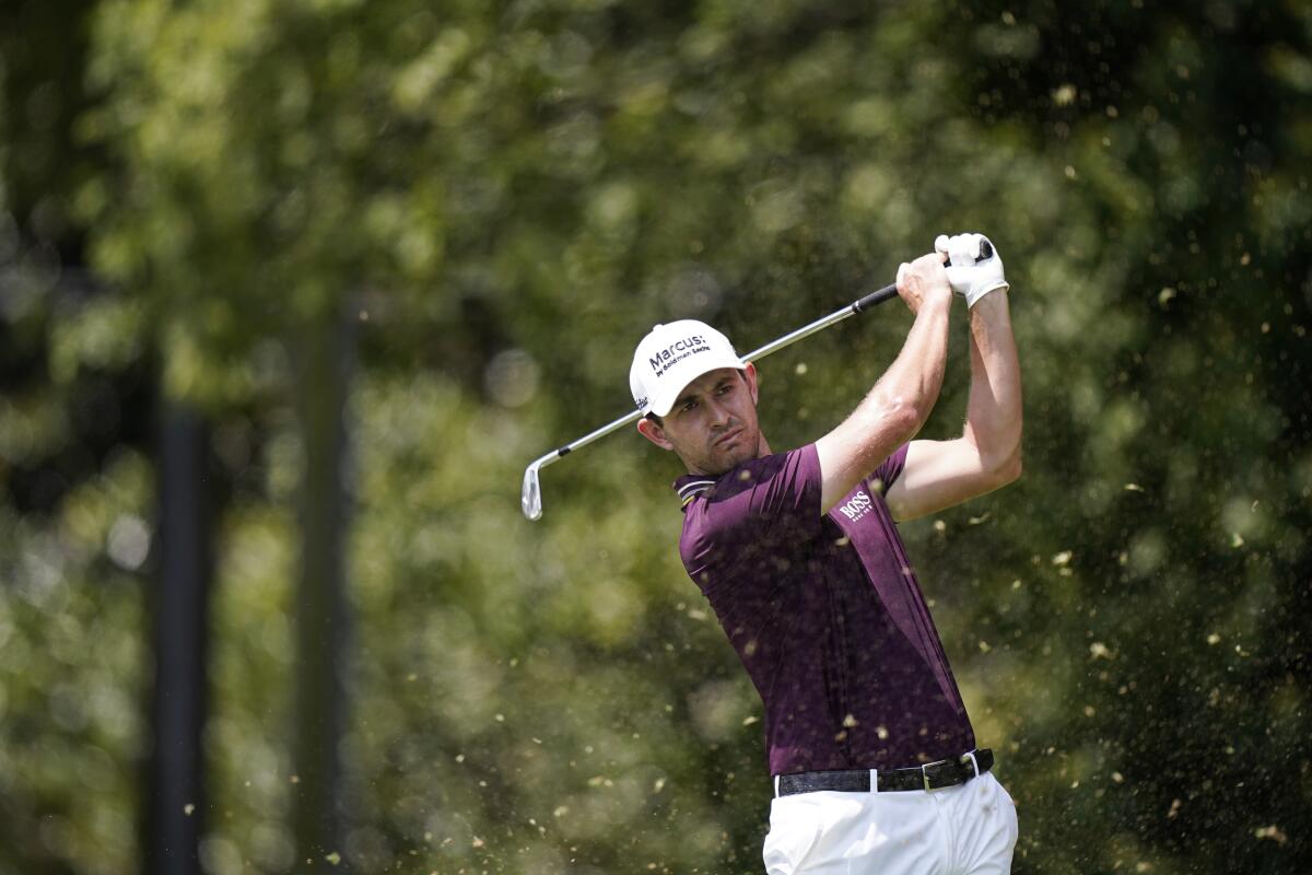 Patrick Cantlay hits from the second tee during the first round of the Tour Championship golf tournament Thursday, Sept. 2, 2021, at East Lake Golf Club in Atlanta. (AP Photo/Brynn Anderson)