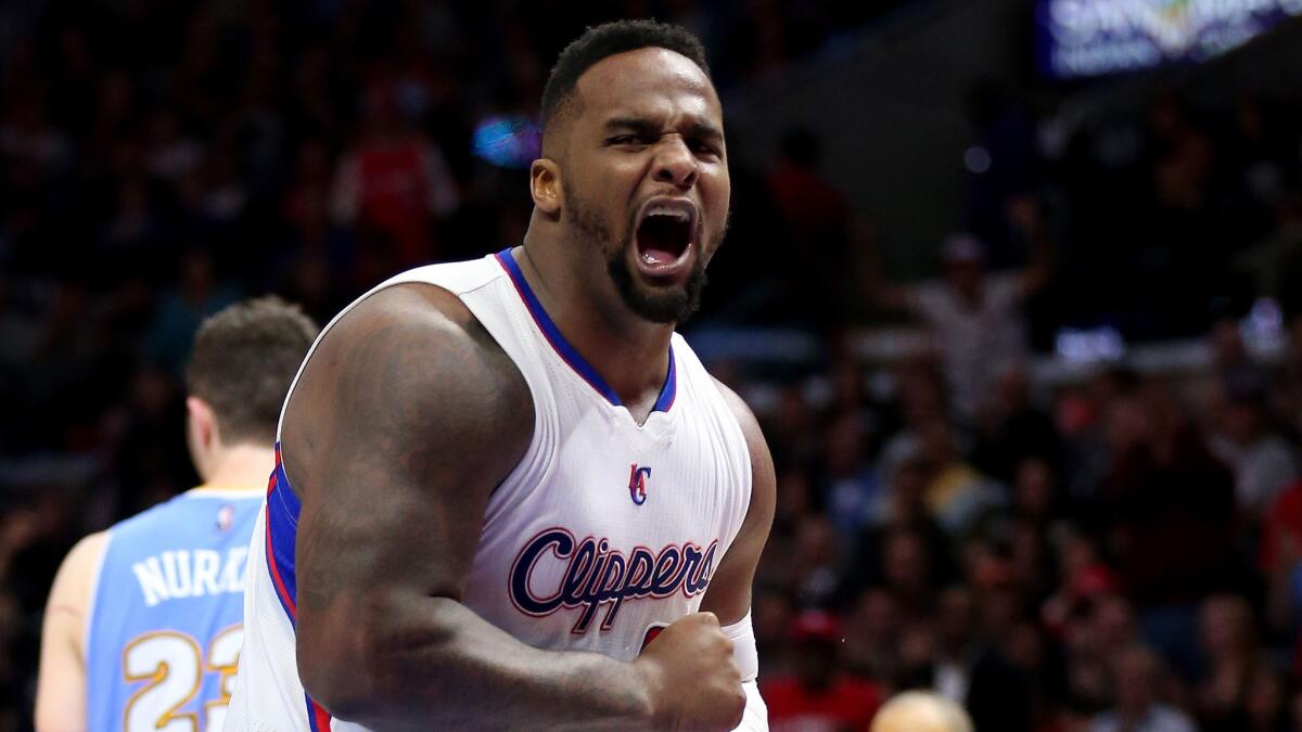 Clippers forward Glen Davis reacts during the team's victory over the Denver Nuggets at Staples Center on Monday.