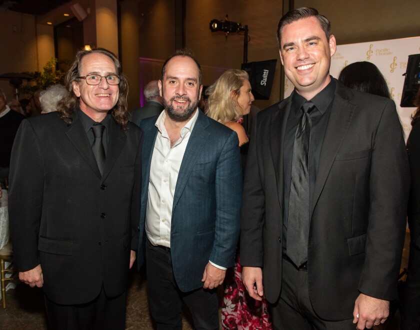Pacific Chorale member Vincent Hans, composer Tarik O'Regan and Pacific Chorale member Ryan Antal.