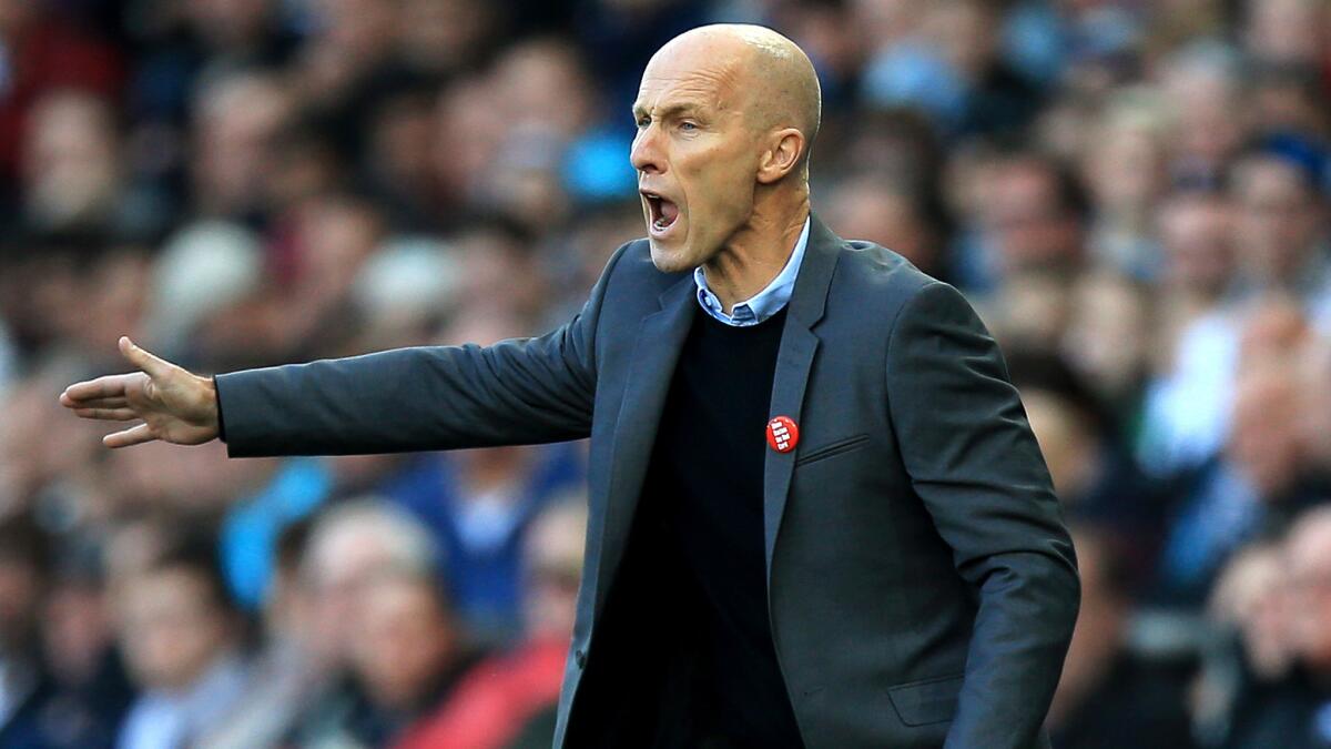 Bob Bradley yells instructions during a Swansea City game in the Premier League on Oct. 22.