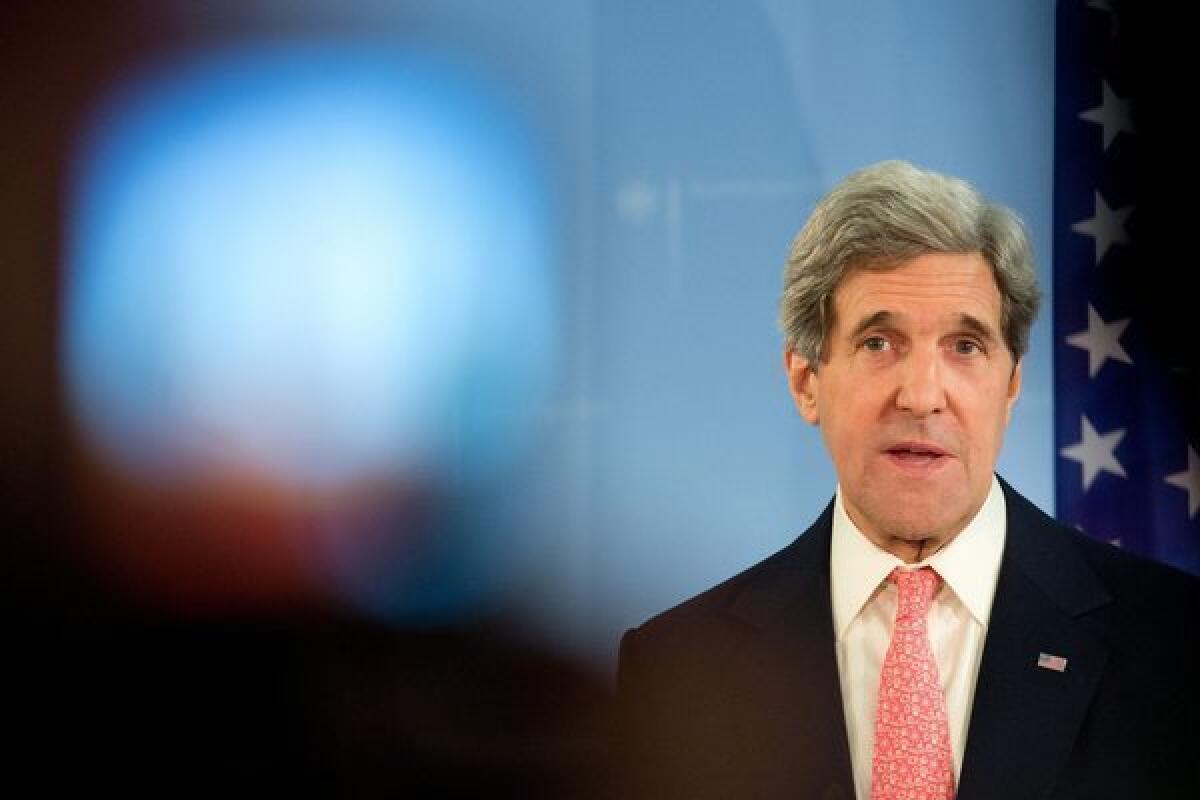 Secretary of State John Kerry speaks during a news conference in Berlin, Germany. Kerry is on an 11-day tour through Europe and the Middle East.