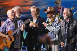 Paul McCartney and Woody Harrelson and members of the Coral Reefer Band pay tribute to Jimmy Buffett at the Hollywood Bowl