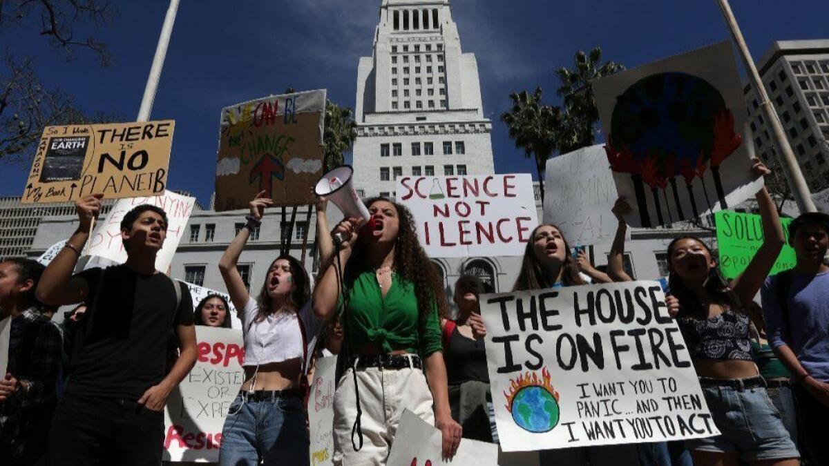 Los Angeles youth join a nationwide strike from school as they protest climate change and strike for the Green New Deal and "other necessary actions to solve the climate crisis," at City Hall in downtown Los Angeles.