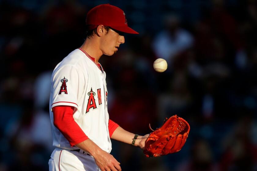 ANAHEIM, CA, TUESDAY, JUNE 28, 2016 - Angels pitcher Tim Lincecum flips the ball out of frustration after surrendering a first inning walk to the Astros at Angel Stadium of Anaheim. (Robert Gauthier/Los Angeles Times)
