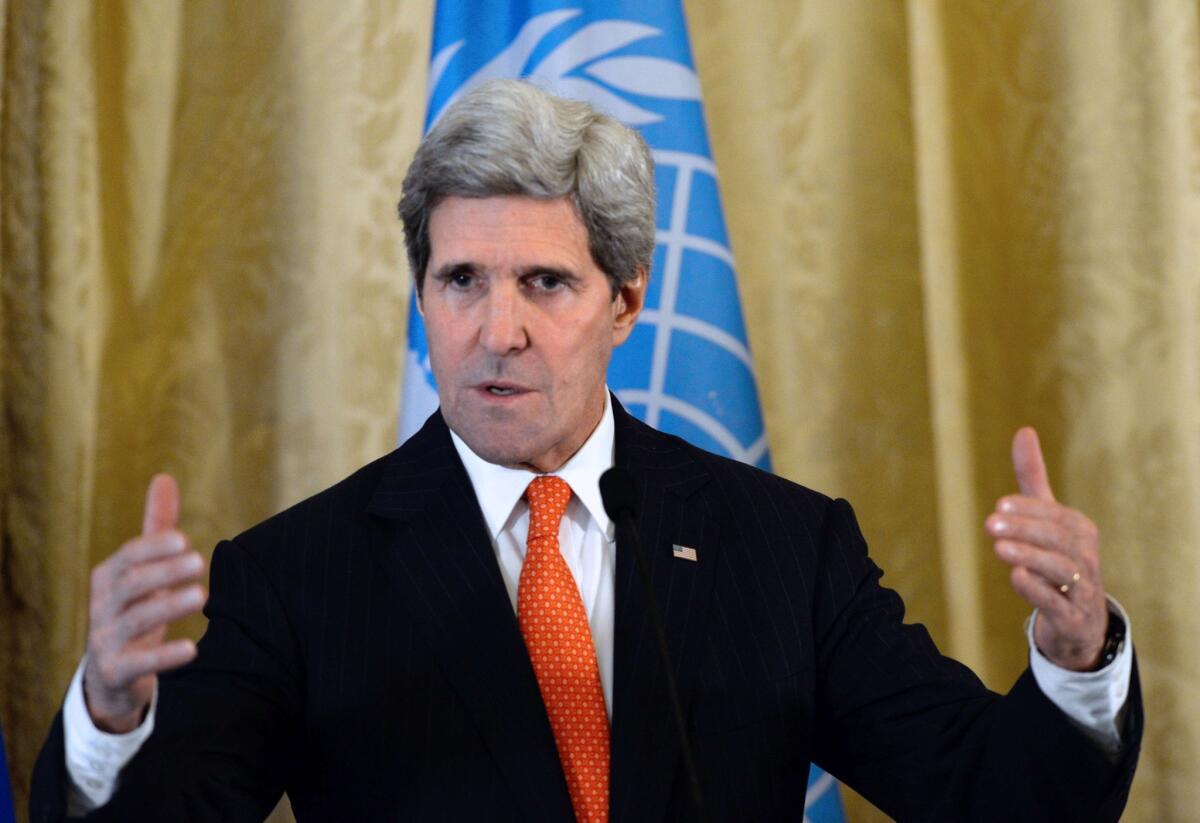 U.S. Secretary of State John Kerry speaks during a press conference with Russia's Foreign affairs minister and U.N.-Arab League envoy for Syria following their meeting at the U.S. ambassador's residence in Paris.
