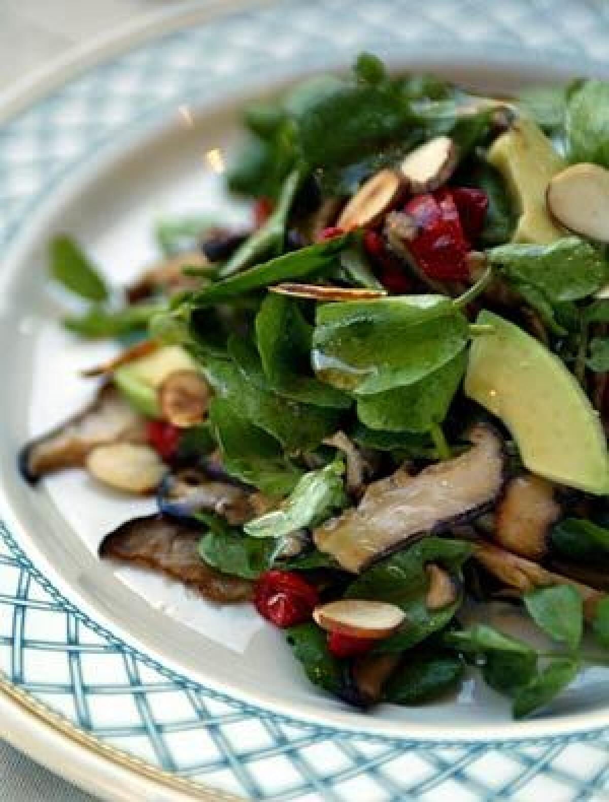 SPRING'S GREENS: Pungent watercress is a natural with almonds and avocado. It stands up to a bold dressing with a soy sauce and lemon base.