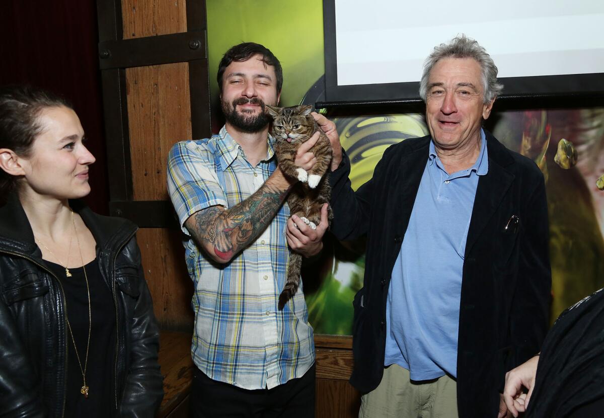 Robert De Niro and cat Lil Bub attend the Directors Brunch during the 2013 Tribeca Film Festival on April 23, 2013 in New York City.