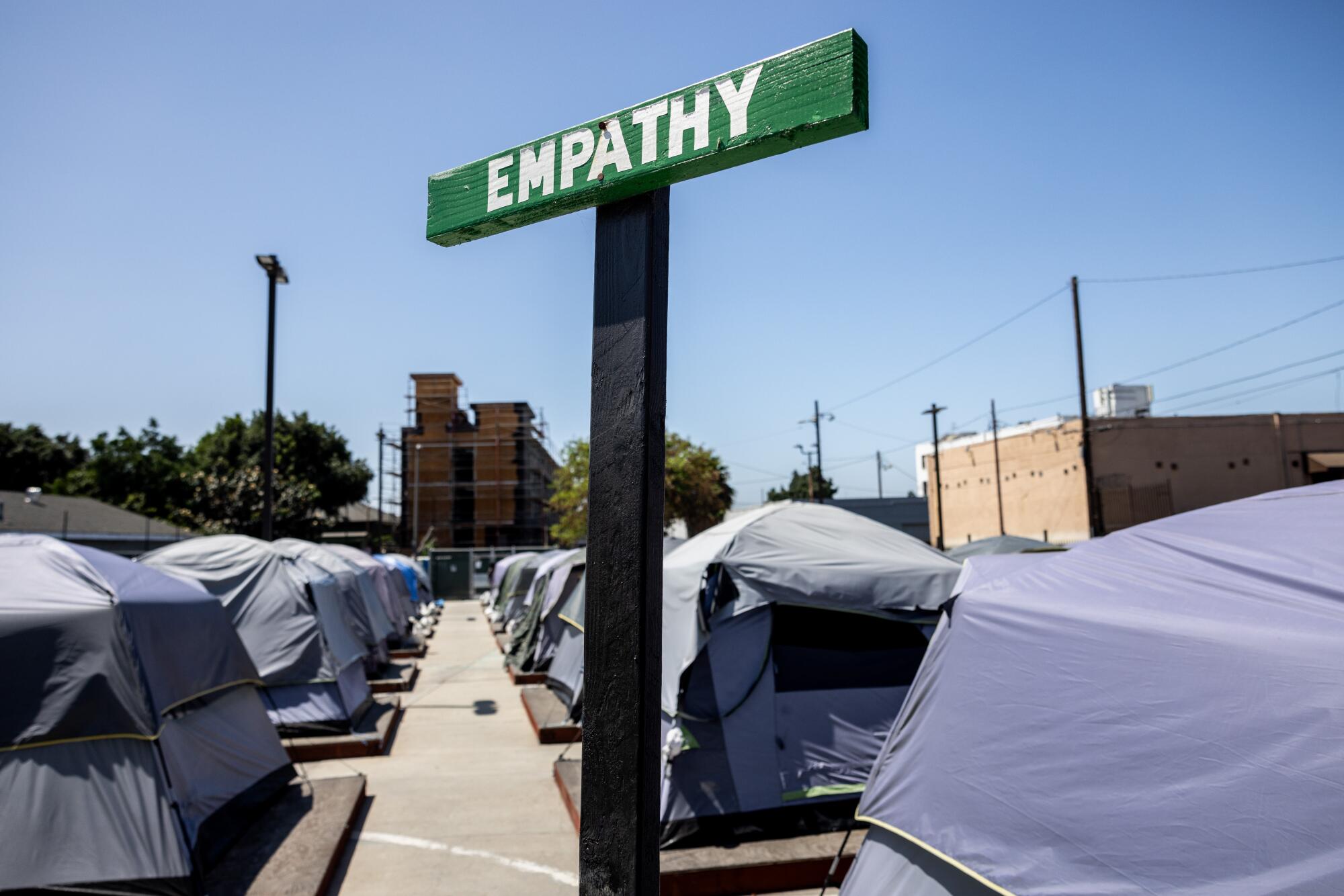 A sign with the word "empathy" posted on the Urban Alchemy homeless site.