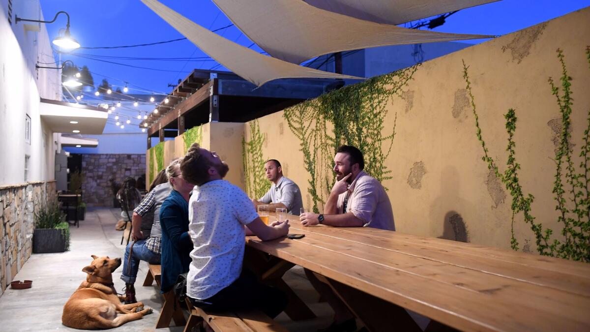 Customers enjoy the patio at Yorkshire Square Brewery in Torrance.