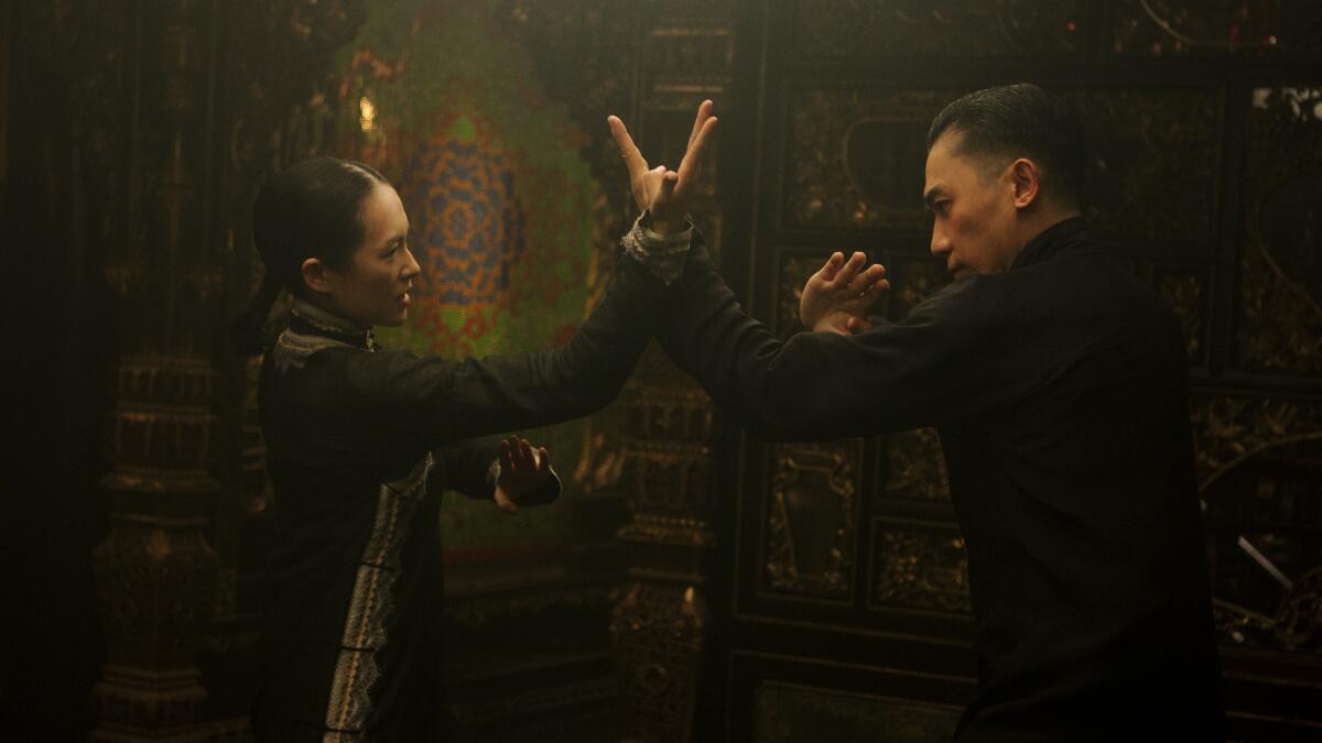 Ziyi Zhang spars with Tony Leung in "The Grandmaster."