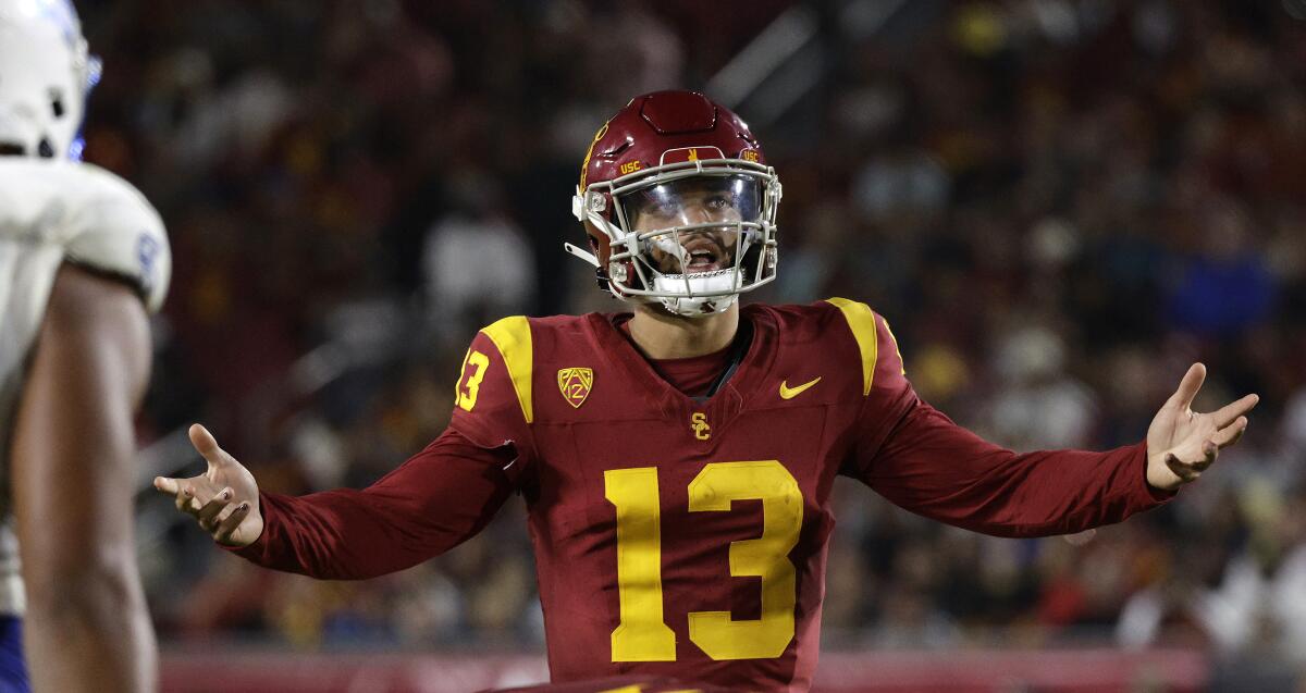 USC quarterback Caleb Williams puts his hands up during a game against San Jose State.