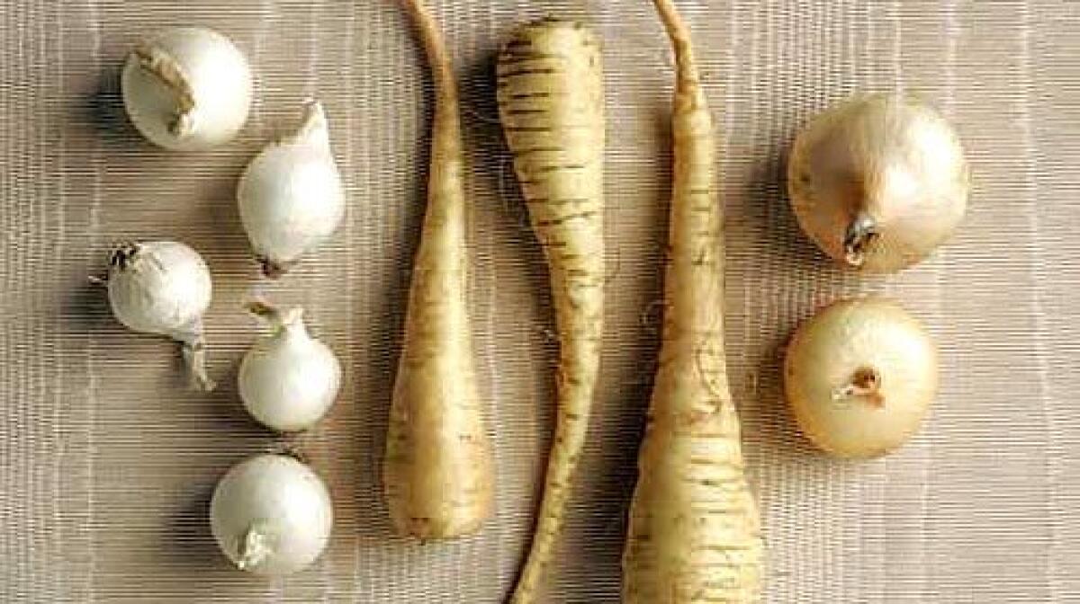 Pearl onions, baby parsnips and cipollini  along with celeriac, celery hearts and potatoes  add subtle interest to the feast.