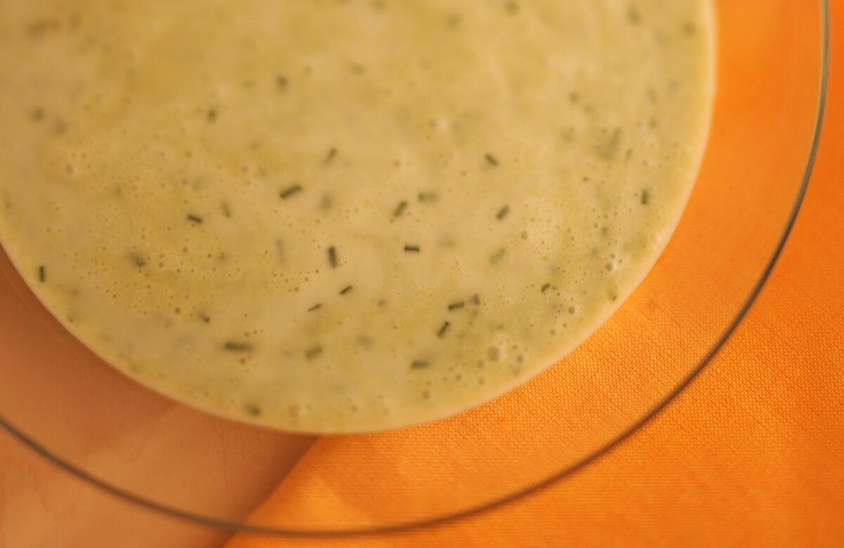 Blend Fresh herbes with crème fraîche to lighten and enrich a chilled soup.