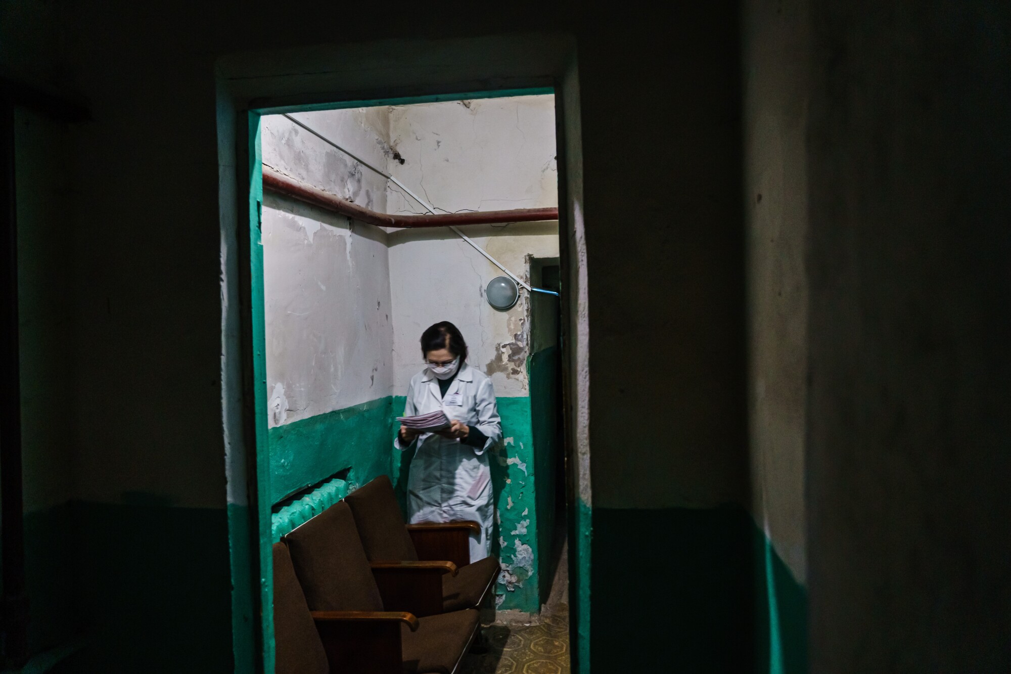 A nurse at a maternity hospital works underground.