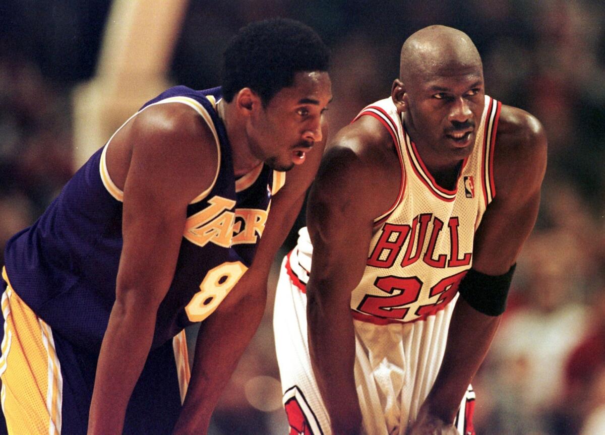 A 19-year-old Kobe Bryant, left, and the Lakers took on 34-year-old Michael Jordan and the Chicago Bulls in 1997.