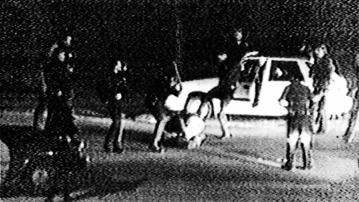 A video shot by George Holliday in 1991 shows L.A. police officers the beating Rodney King.