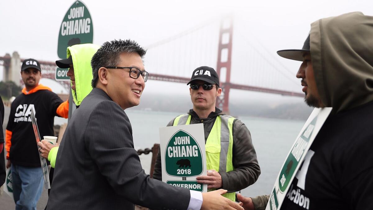 State Treasurer John Chiang, campaigning for governor near the Golden Gate Bridge on June 7, has promoted his environmental record during his eight years on the State Lands Commission as state controller. (Justin Sullivan / Getty Images)
