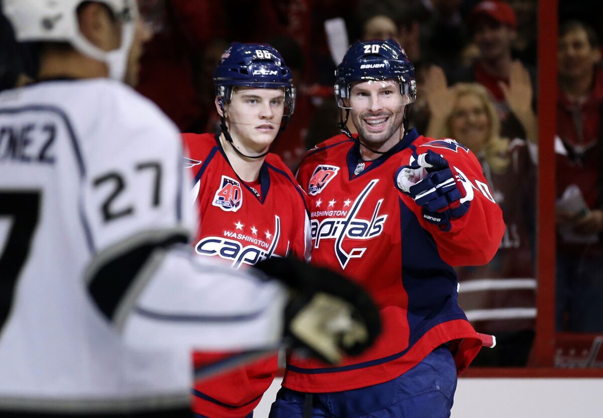 Washington's Troy Brouwer, right, celebrates his goal during the first period against the Kings with teammate Andre Burakovsky. The Capitals beat the Kings, 4-0.
