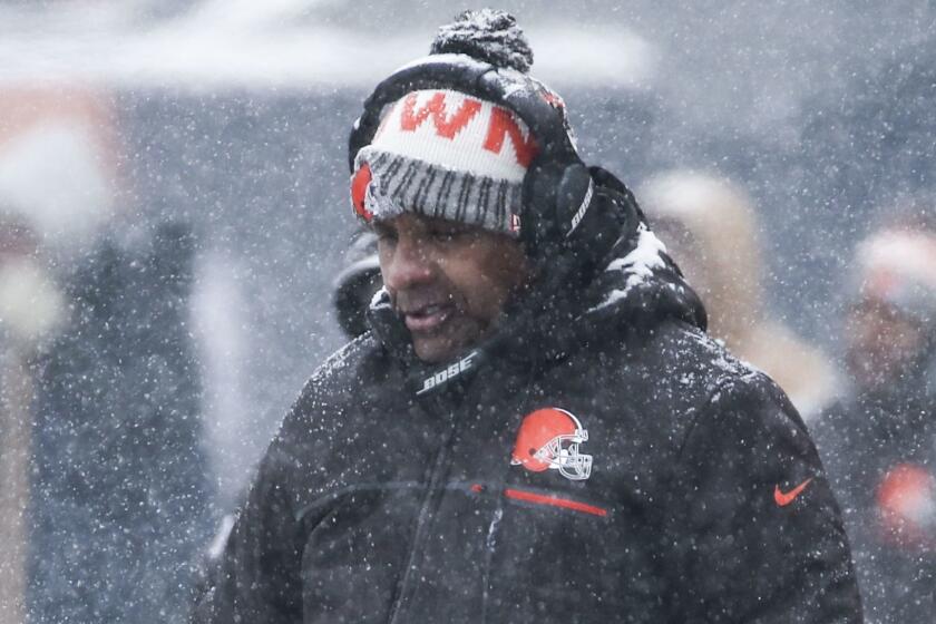 Mandatory Credit: Photo by TANNEN MAURY/EPA-EFE/REX/Shutterstock (9301106s) Cleveland Browns head coach Hue Jackson walks the sidelines as snow falls in the first half of their NFL game against the Chicago Bears at Soldier Field in Chicago, Illinois, USA, 24 December 2017. Cleveland Browns at Chicago Bears, USA - 24 Dec 2017 ** Usable by LA, CT and MoD ONLY **