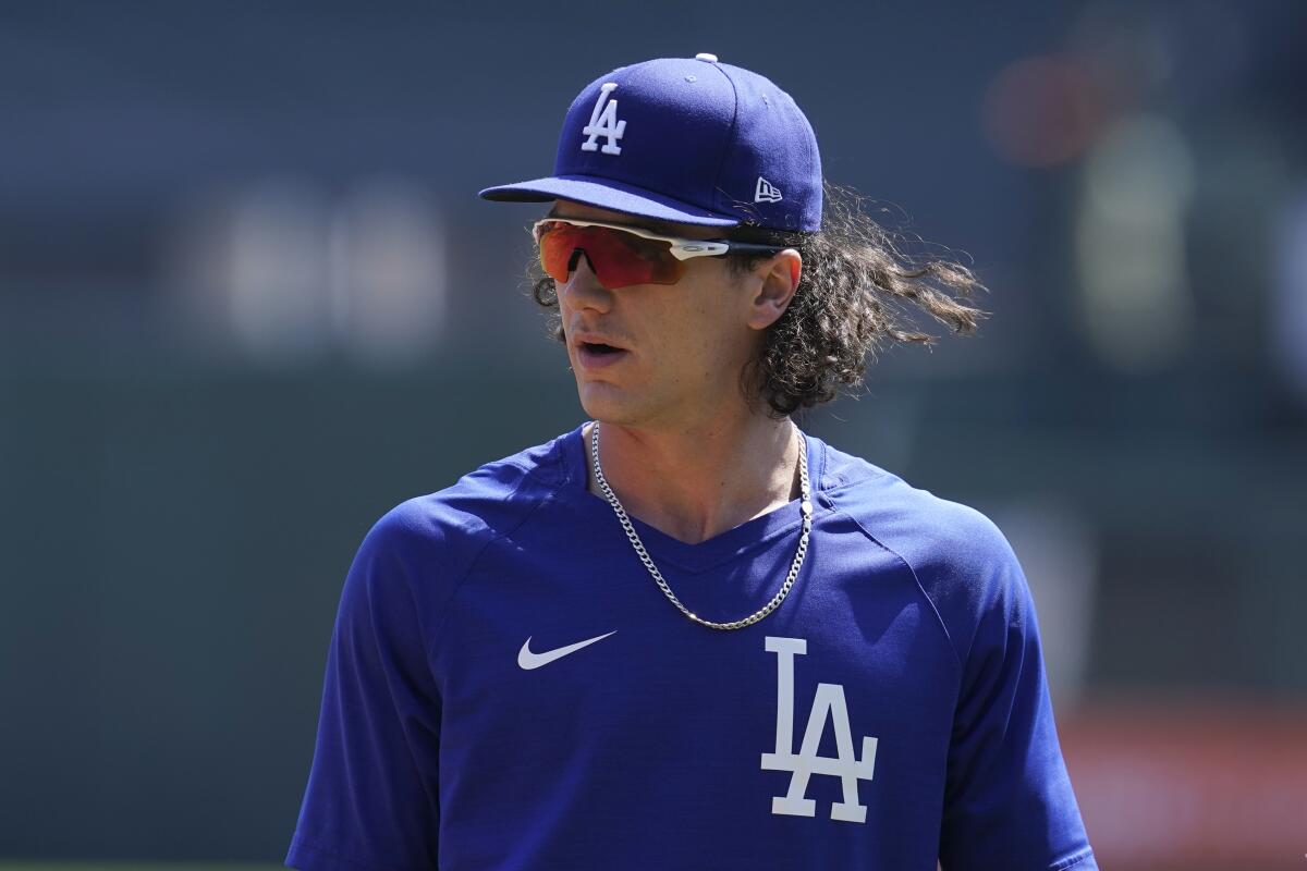 Dodgers outfielder James Outman stands on the field before a game against the San Francisco Giants.