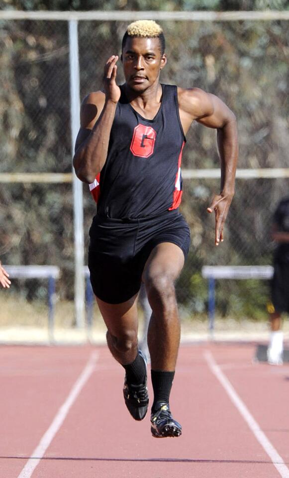 Glendale's Michael Davis, from the start of the 100 meter, dominated to win with a time of 10.5 seconds against Crescenta Valley in a Pacific League track meet at Crescenta Valley High School in La Crescenta on Tuesday, April 3, 2013.