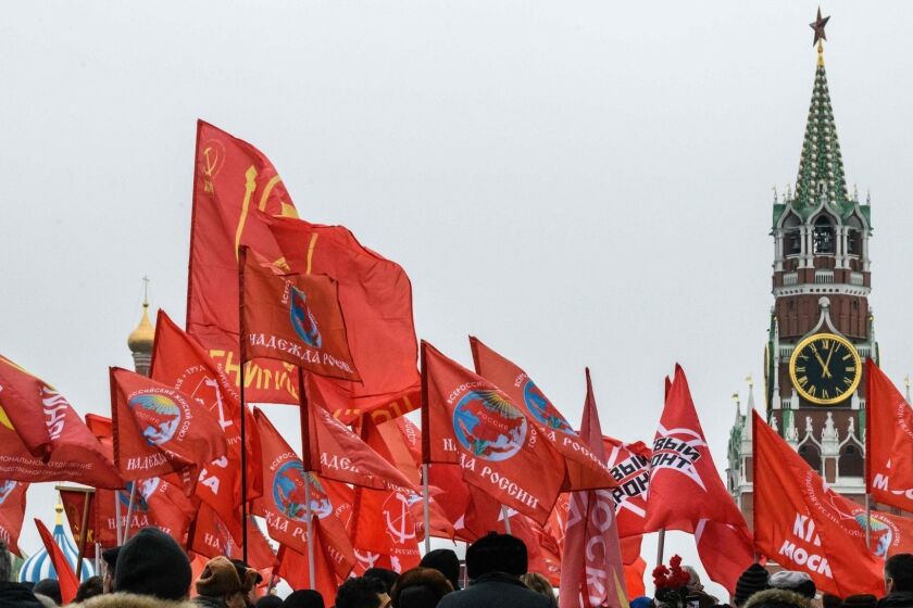 People holding red flags gather to pay respect at the grave of Soviet leader Joseph Stalin outside the Kremlin on the Red Square in Moscow on March 5, 2019. - Members of different Communist and Left movements gather on the Red Square to mark the 66th anniversary of Stalin's death. (Photo by Mladen ANTONOV / AFP)MLADEN ANTONOV/AFP/Getty Images ** OUTS - ELSENT, FPG, CM - OUTS * NM, PH, VA if sourced by CT, LA or MoD **